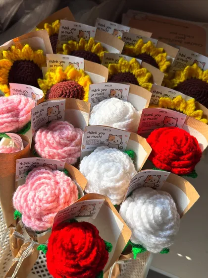 Another view of the single-stem roses and sunflowers, showcasing the different colors available.