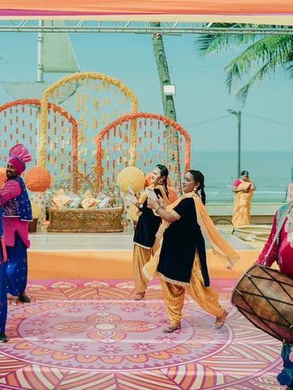 Dhol players and Gidda dancers add a traditional and energetic Punjabi touch to the festivities.