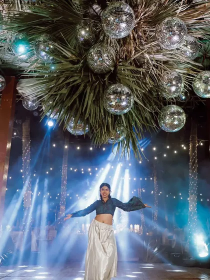 Bringing the party to life with a ceiling of disco balls and dramatic lighting. For this Sangeet, the goal was to create a fun, retro-glam vibe that got everyone onto the dance floor.