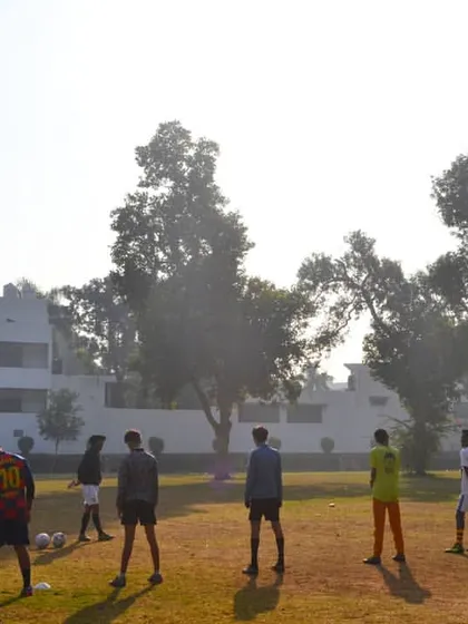 A moment of instruction on the field. Our AIFF-licensed coaches are always on hand to provide real-time feedback and strategic advice during training.