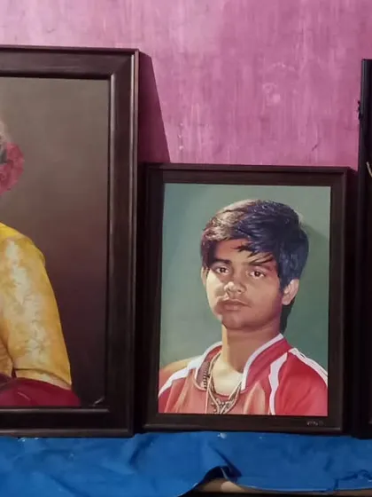 A collection of three framed custom portraits of varying sizes. This shows the versatility of my portrait service, from a larger piece of a woman in traditional attire to smaller, more personal portraits.