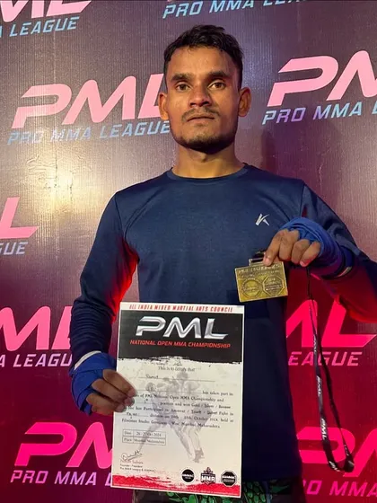 Another shot of Ramit with his certificate and medal. We ensure our fighters get the recognition they deserve for their hard work and success in the cage.
