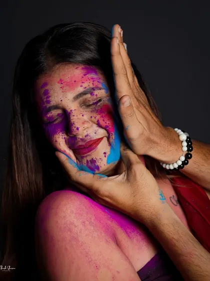 A tender moment in a storm of color. This conceptual Holi shot uses the interaction between two people to tell a story of connection and celebration.