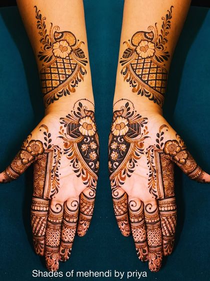 Intricate Bridal & Engagement Mehendi photo 14