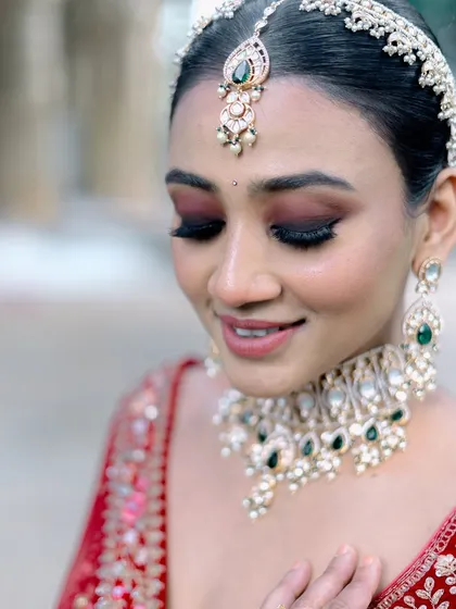 A close-up on the classic bridal smokey eye. I blend shades of brown and black to create depth and definition, making the eyes the focal point of the look.
