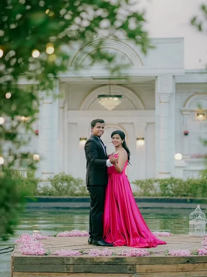 A beautiful, dreamy shot with fairy lights framing the couple. This photo from Aditya and Priyanka's set shoot is the definition of a fairytale romance.