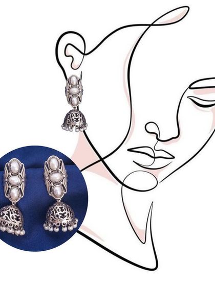 Our top-notch silver earrings that will perfectly blend with your attire. This graphic features our classic pearl and silver jhumkas.