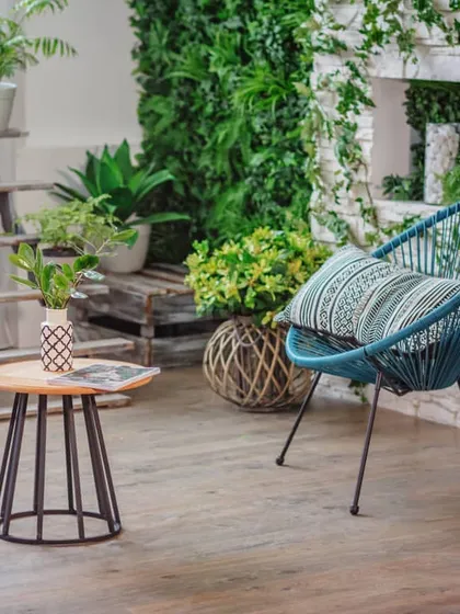 We create peaceful indoor green zones for daily relaxation. This custom vertical garden, paired with comfortable seating and natural textures, turns a simple corner into a beautiful and serene retreat.