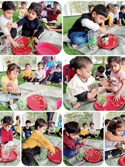 As part of our 'Animals' theme, children learned to create their own mini-aquarium, carefully placing pebbles, plants, and toy fish in a jar.