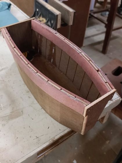 We experimented with making a model boat by kerfing, which is cutting slits into plywood to allow it to bend. This one is destined to become a unique planter.