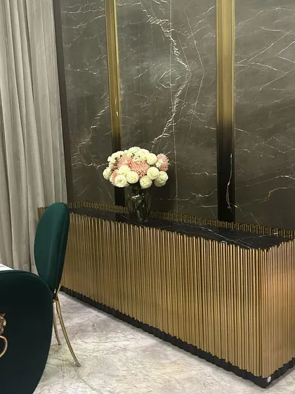 Another view of the gold-fluted sideboard, a piece that exudes luxury and modern glamour.