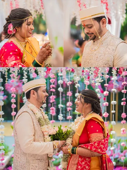 The 'varmala' or garland exchange, a joyful and significant ritual, captured here with the couple's happy expressions.