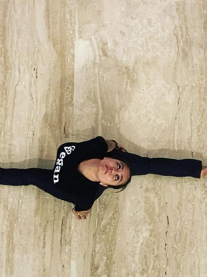 A quick stretch after a tiring day. A simple Hanumanasana (front split) can do wonders to release the hamstrings and calm the mind.