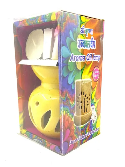 Another one of my aroma oil lamp sets, shown here in its colorful packaging. This yellow ceramic diffuser set also includes a tealight and aroma oil to get you started.