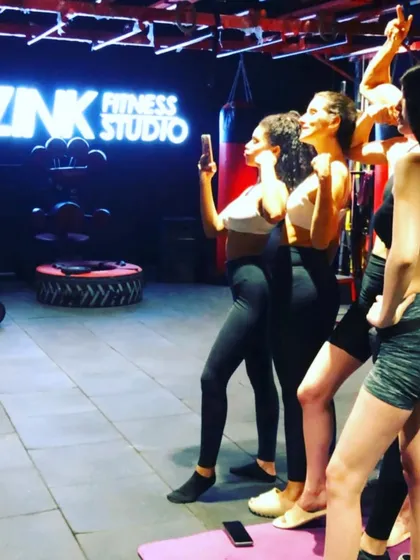 It’s awesome to spread beautiful smiles. This photo captures our members taking a group selfie after a great workout session.