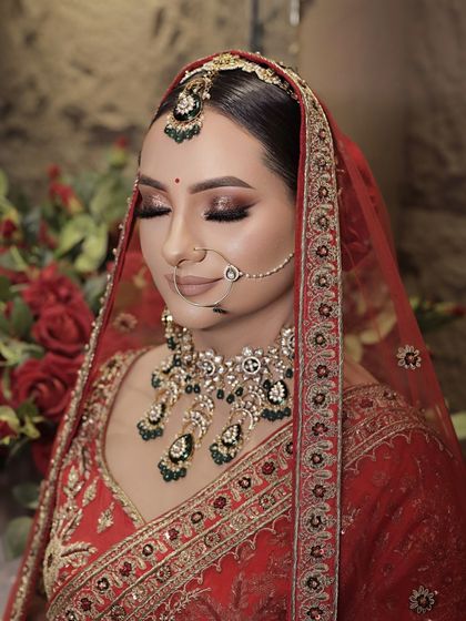 Another angle of this beautiful bridal makeup, showing how the highlighter catches the light to create a radiant glow. The skin looks smooth and flawless, not heavy or cakey.