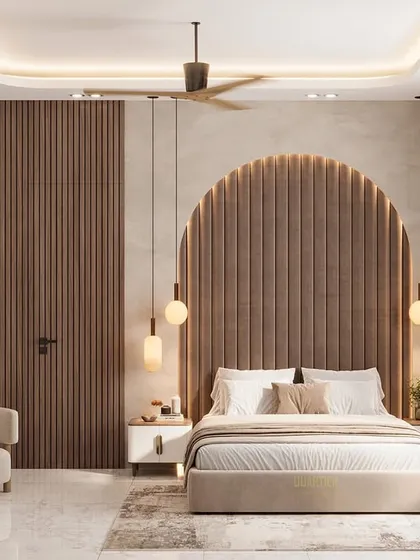 A master bedroom design with a Scandinavian theme. The back wall features an arched, quilted headboard set against a backdrop of PVC louvers. The room has a calm and serene feel.