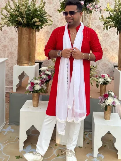 Another look at the classic red kurta, perfect for a variety of traditional Indian ceremonies.