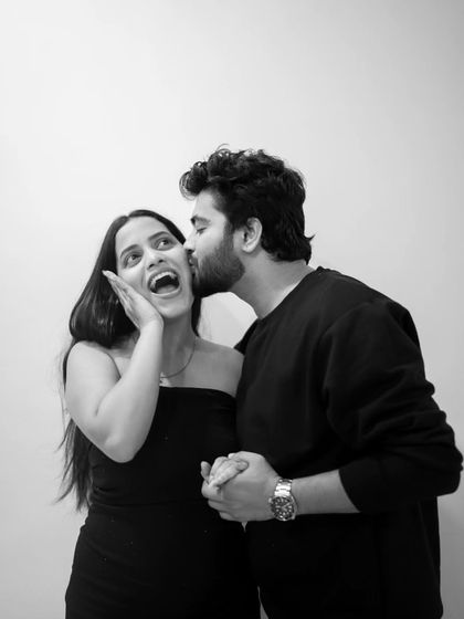 This is the color version of a wonderfully candid moment. The surprise and joy on her face are so genuine, and it makes for a portrait that is full of life and personality.