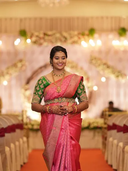 The bride making her entrance at the engagement hall.