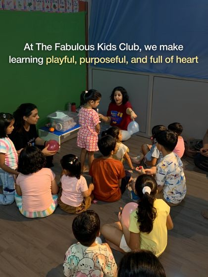 At our club, we make learning playful, purposeful, and full of heart. This image of a group story time captures the warm, engaging atmosphere we create.