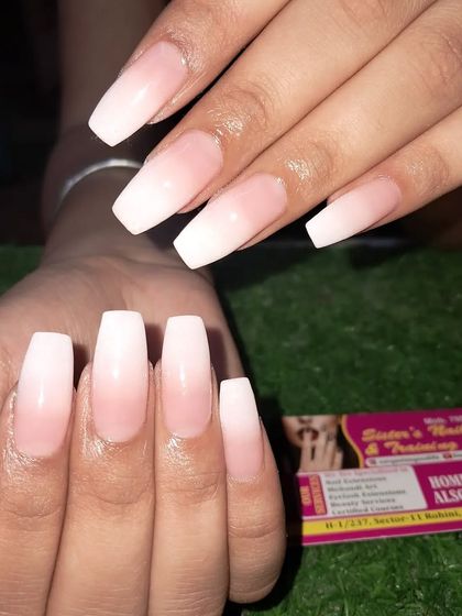 A still image of the classic and clean French ombre on coffin nails.