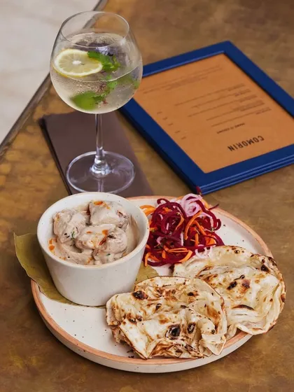 Our smoked chicken curry served with a light and refreshing gin and tonic. The smoky, rich flavours of the curry are balanced by the crispness of the cocktail.