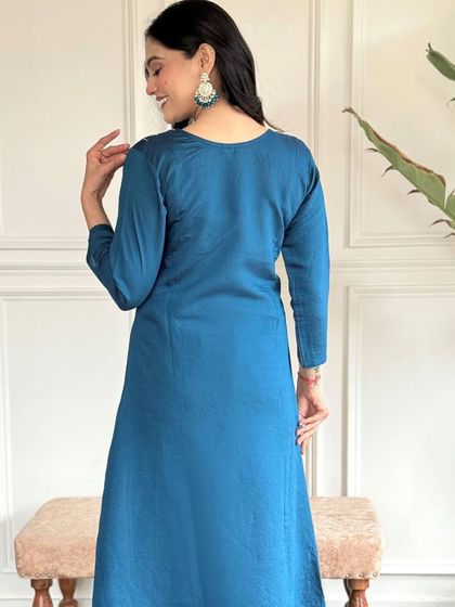 This blue chanderi viscose kurta is a versatile piece. The heavy thread embroidery on the neckline adds a touch of detail that elevates the whole look.