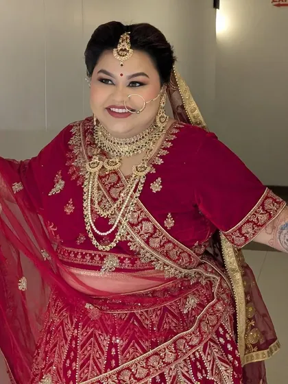 A joyful shot of Shreyoshi. Her smile says it all. The makeup was designed to enhance her happiness and make her feel like a bride all over again.