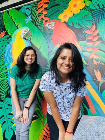 This vibrant tropical mural featuring two large macaw parrots was a joy to create. The bold colors and dense foliage on a black background make for a dramatic and stunning photo point in a restaurant.