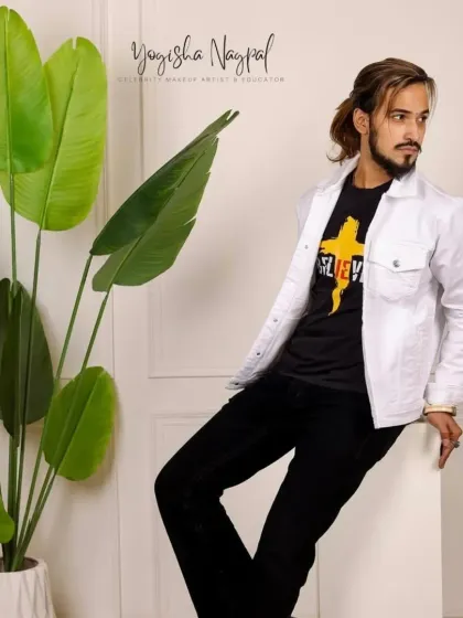 Makeup for an international model. Men's makeup is about enhancing confidence with subtle perfection, and this look is a prime example of clean, professional grooming.