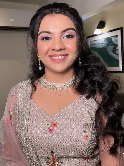 Another angle of this beautiful engagement makeup. The soft colors and glowing skin create a look that is both sophisticated and modern.
