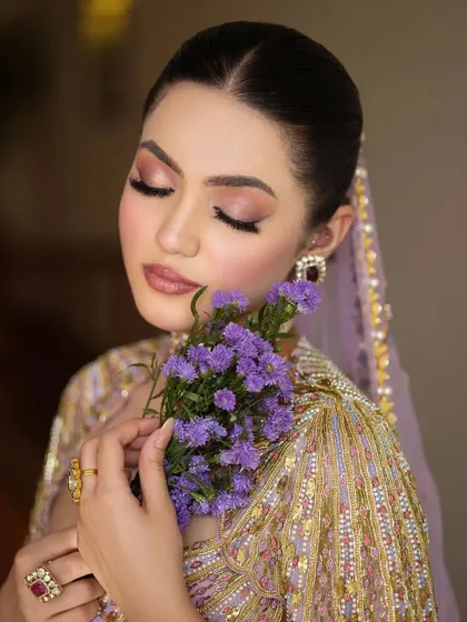 A soft and romantic close-up. The lavender flowers complement the pastel hues of the Papa Don't Preach outfit, creating a dreamy and ethereal vibe.