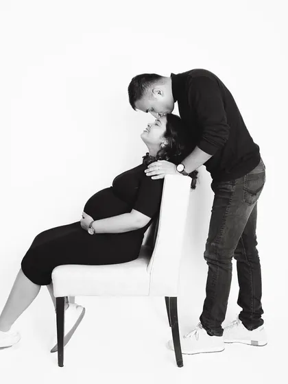 The same portrait in black and white. Stripping away the color brings the focus to the emotion and connection, creating a timeless and artistic image of this special moment.