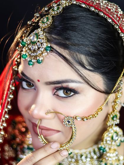 A close-up shot highlighting the precision of the nose ring and the flawless skin finish.