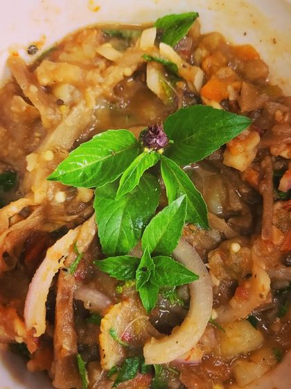 A closer look at the Manipuri Eromba, a healthy mash of vegetables and fermented fish. You can see the different textures of potato, tomato, and onion mixed together.