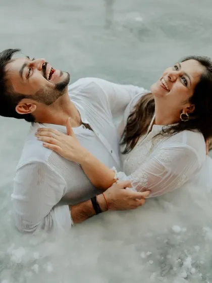 Who says romance can't be playful? This underwater-themed shoot with dry ice was all about creating something unique. The genuine, unrestrained laughter amidst the mist shows that the most creative concepts work best when you can just be yourselves.