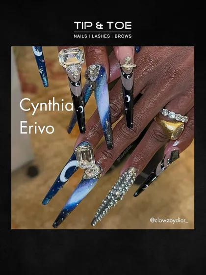 The Grammy Awards are a source of major inspiration. These celestial-themed nails with intricate details and gemstone embellishments are a perfect example of wearable art.