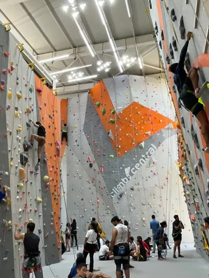A full view of the gym shows the scale and variety we offer. From beginner slabs to overhanging challenges, there's a route for you.