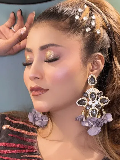 A close-up of the eye makeup from this glam shoot, featuring a beautiful blend of glitter and shimmer.