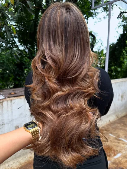 Her crowning glory. This stunning 'Butter Blonde' is warm, bright, and full of dimension. I used a balayage technique to create a natural, sun-kissed effect.