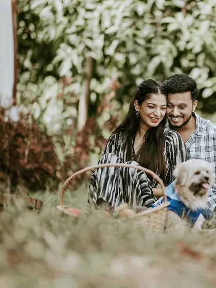 A joyful collage featuring a couple and their pet dog, capturing the warmth and fun of their family-to-be.