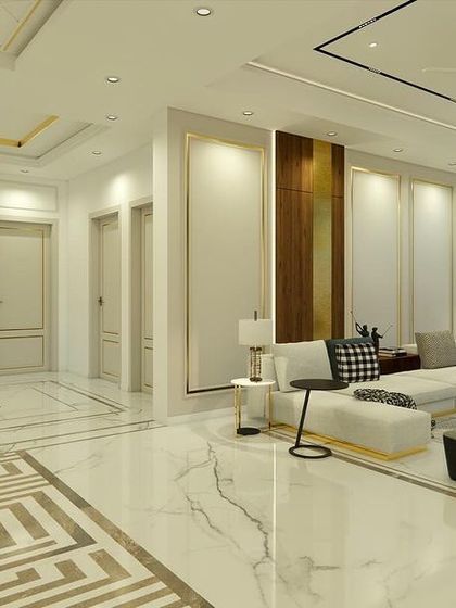 A wide view of the living and lobby area in "Yash Villa," showcasing the geometric marble inlay on the floor and the open, flowing layout.