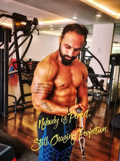 In the gym, every rep counts. Here I am chasing perfection, because nobody is perfect. Using proper form on the cable machine to isolate the bicep is key for building that peak.