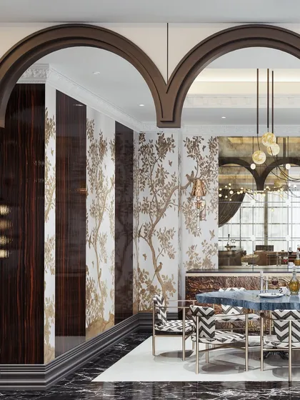 This angle highlights the contrast between the dark wood panels and the delicate, gold-patterned wallpaper, demonstrating a rich and layered material palette.