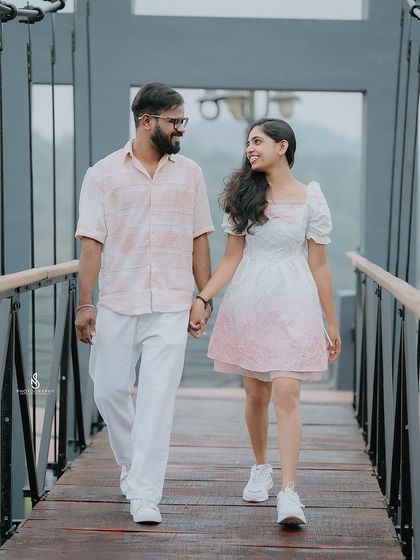 A candid walking shot on a suspension bridge over the water. This type of location adds an element of adventure to the shoot.