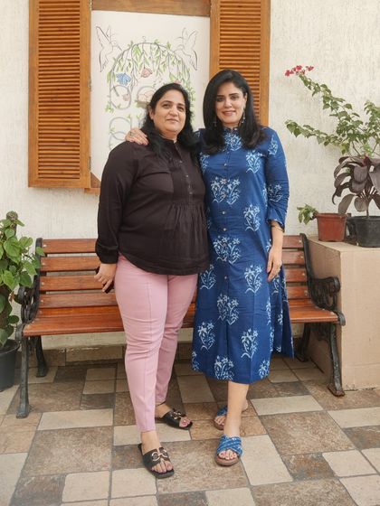 With my dear college friend, Nehu. This indigo dress is easy to wear and stylish, making it a great choice for a long day of catching up with a friend.