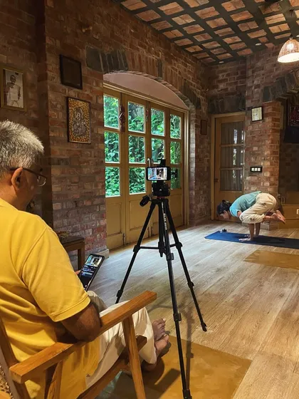 A behind the scenes look at our daily yoga marathon. While one of us teaches on camera, the other monitors the live session, ensuring a smooth and connected experience for our online community.