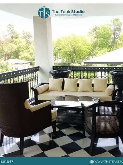 This elegant outdoor seating set is perfect for enjoying the weather on a balcony or patio. It includes a comfortable sofa and classic armchairs with caned details, all crafted to withstand the elements.