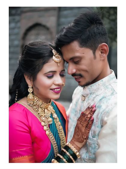 An intimate portrait of a newly engaged couple, capturing their serene and happy expressions.